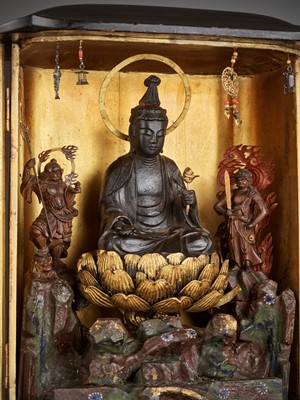 A LARGE BLACK AND GOLD LACQUERED SHRINE (ZUSHI) WITH KANNON, BISHAMONTEN AND FUDO MYO-O