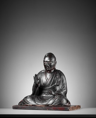 Lot 174 - A LACQUERED WOOD FIGURE OF A SEATED BUDDHIST MONK