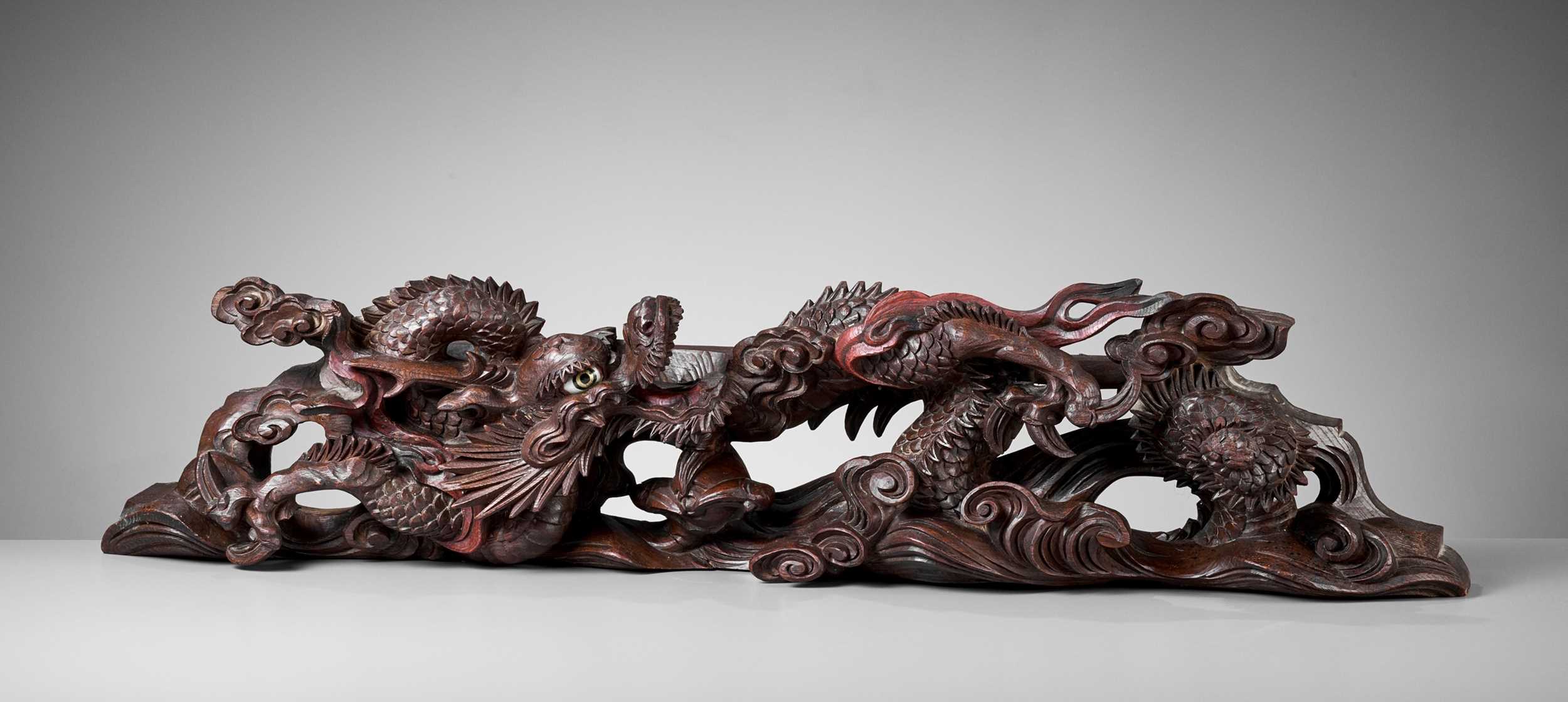 Lot 84 - A LARGE CARVED AND PAINTED WOOD ARCHITECTURAL ELEMENT WITH A DRAGON