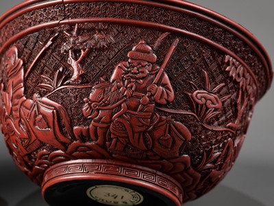 Lot 280 - A RARE RED LACQUER ‘MONGOL HUNT’ BOWL, ATTRIBUTED TO ZHOU ZHU