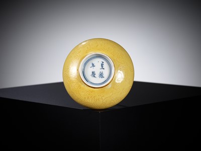 Lot 509 - AN INCISED YELLOW-GLAZED ‘PHOENIX’ BRUSHWASHER, EARLY QING DYNASTY