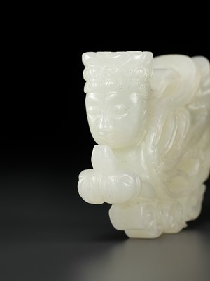 Lot 452 - A WHITE JADE CARVING OF AN APSARA, QING DYNASTY OR EARLIER