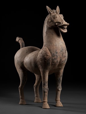 Lot 61 - A MONUMENTAL SICHUAN POTTERY FIGURE OF A HORSE, HAN DYNASTY