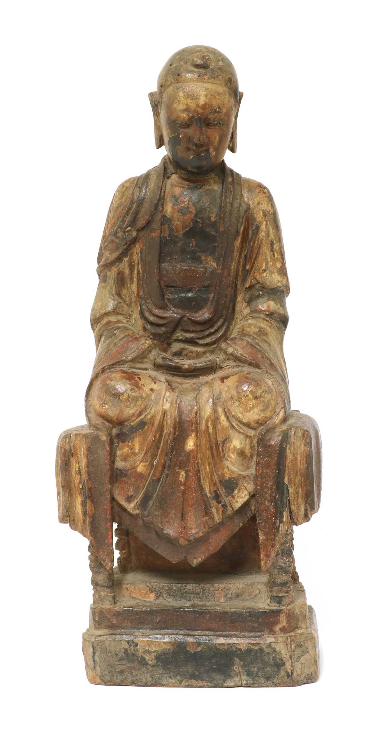 Lot 29 - A CARVED HARDWOOD FIGURE OF BUDDHA, MING