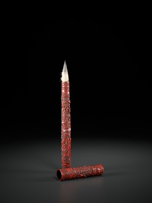 Lot 415 - A CARVED CINNABAR LACQUER ‘SCHOLARS’ BRUSH AND COVER, LATE MING DYNASTY