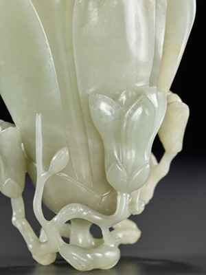 Lot 448 - A SUPERB PALE CELADON JADE ‘MAGNOLIA’ VASE, 18TH CENTURY