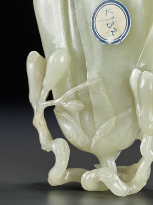 Lot 448 - A SUPERB PALE CELADON JADE ‘MAGNOLIA’ VASE, 18TH CENTURY