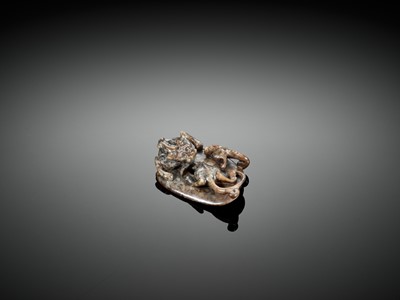 Lot 437 - A GRAY JADE ARCHAISTIC ‘CHILONG’ PENDANT, YUAN TO MING DYNASTY
