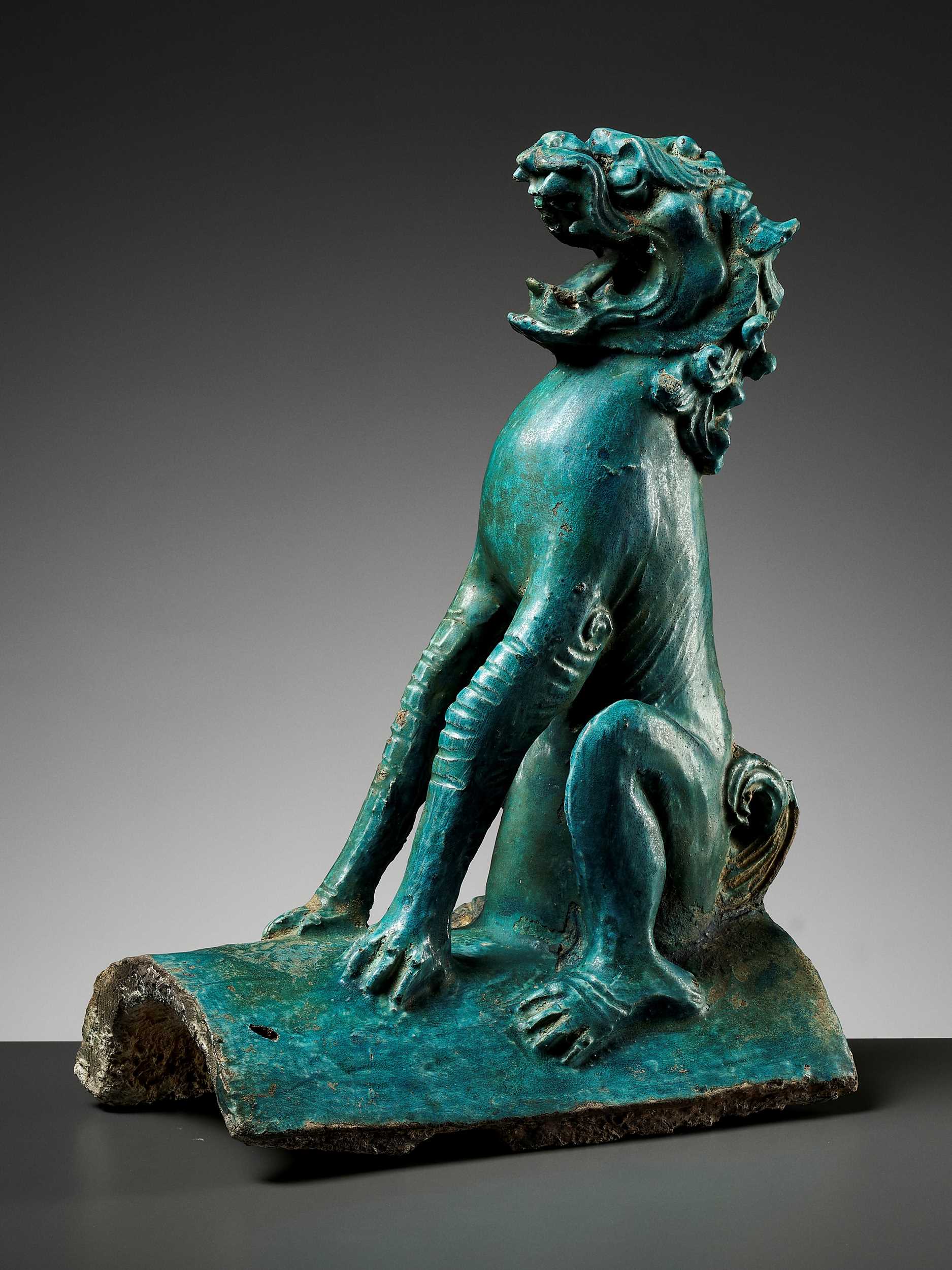 Lot 66 - A TURQUOISE-GLAZED ‘LION’ ROOF TILE, MING DYNASTY
