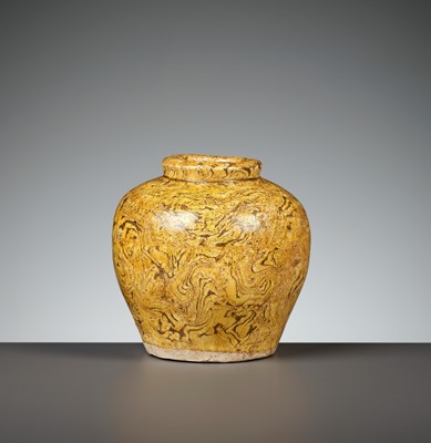 Lot 162 - AN AMBER-GLAZED MARBLED POTTERY JAR, TANG DYNASTY