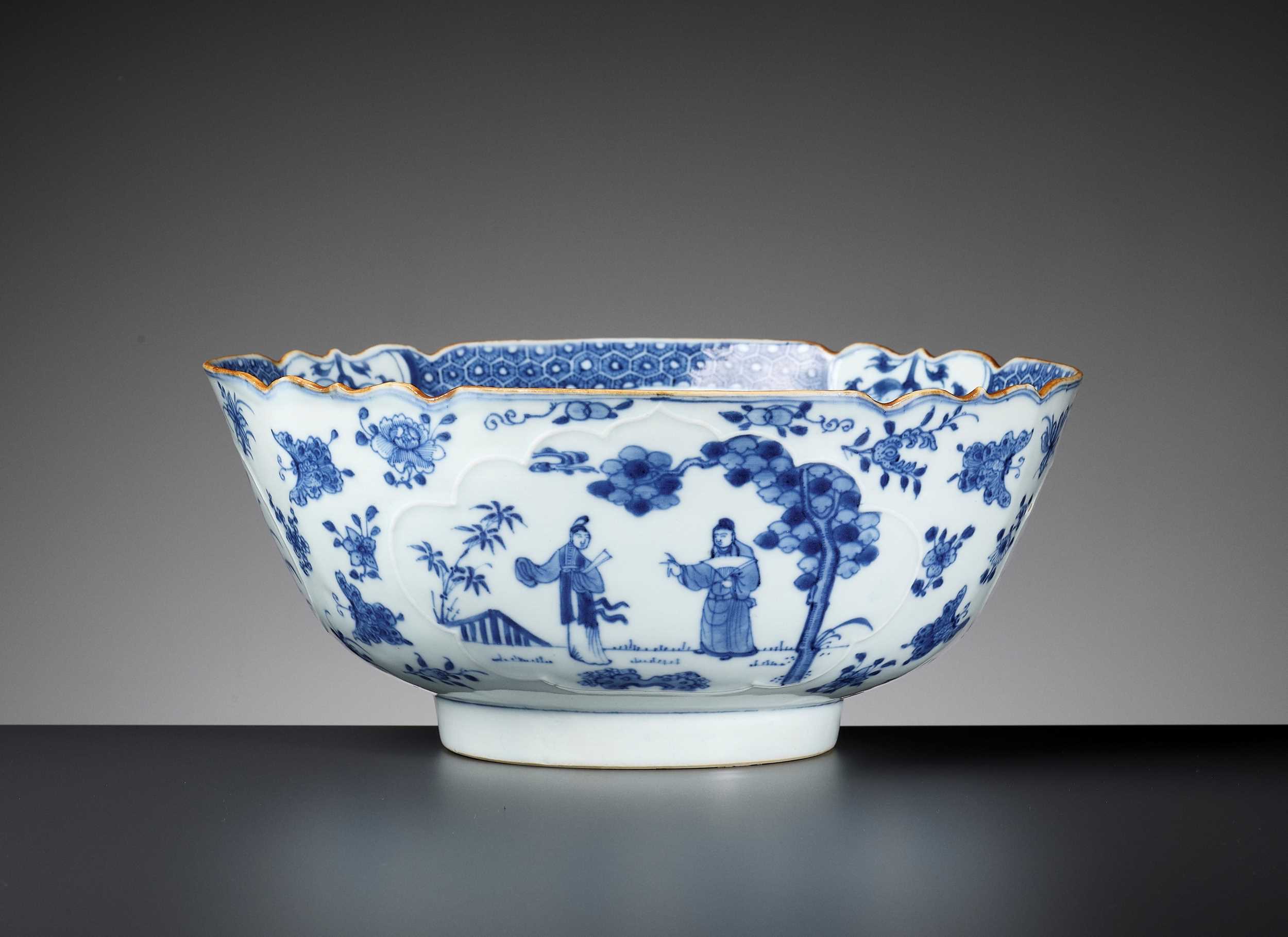 Lot 427 - A BLUE AND WHITE PORCELAIN BOWL WITH FLOWERS AND BUTTERFLIES, QIANLONG PERIOD