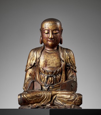 Lot 388 - A GILT-LACQUERED WOOD FIGURE OF A LUOHAN, MING DYNASTY