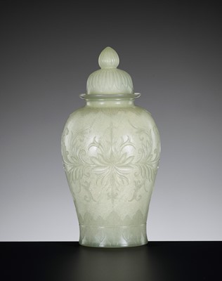 Lot 109 - A MUGHAL-STYLE CELADON JADE VASE AND COVER, QING DYNASTY