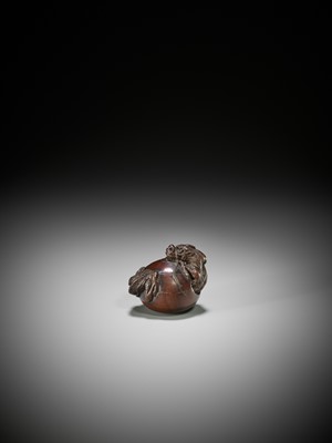 Lot 104 - A RARE WOOD NETSUKE OF A DRAGON EMERGING FROM A TAMA