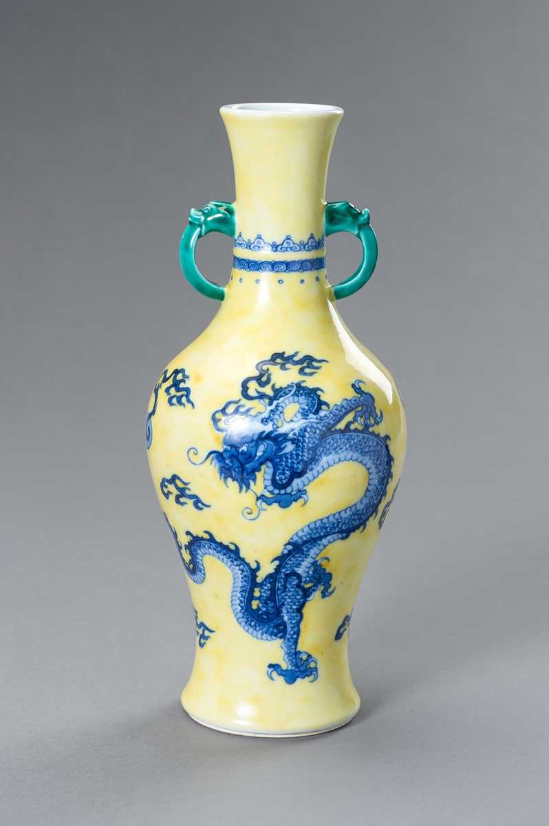 Lot 644 - A BLUE AND YELLOW PORCELAIN ‘DRAGON’ VASE