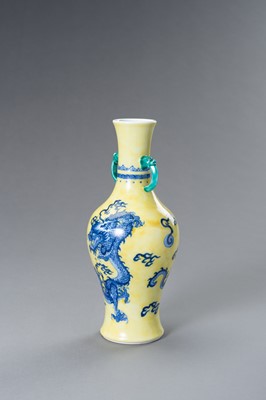 Lot 644 - A BLUE AND YELLOW PORCELAIN ‘DRAGON’ VASE