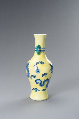 Lot 644 - A BLUE AND YELLOW PORCELAIN ‘DRAGON’ VASE