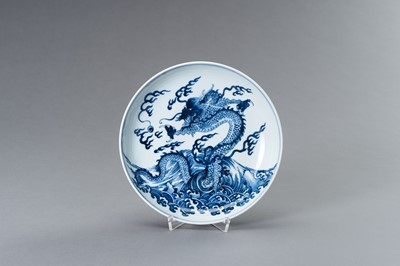 Lot 832 - A BLUE AND WHITE PORCELAIN ‘DRAGON’ PLATE