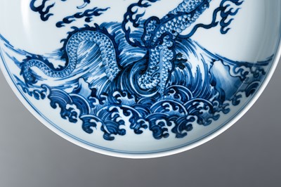 Lot 832 - A BLUE AND WHITE PORCELAIN ‘DRAGON’ PLATE