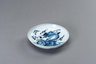 Lot 832 - A BLUE AND WHITE PORCELAIN ‘DRAGON’ PLATE