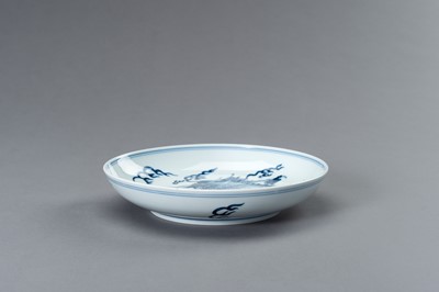 Lot 832 - A BLUE AND WHITE PORCELAIN ‘DRAGON’ PLATE