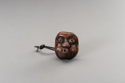 Lot 461 - A LARGE HYOTTOKO MASK WOOD NETSUKE