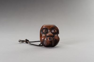 Lot 461 - A LARGE HYOTTOKO MASK WOOD NETSUKE