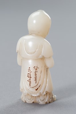 Lot 218 - A SOAPSTONE GROUP OF GUANYIN WITH BOY