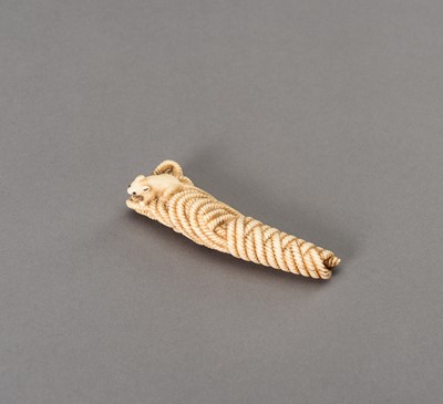 Lot 201 - A STAG ANTLER NETSUKE OF A RAT ON ROPE