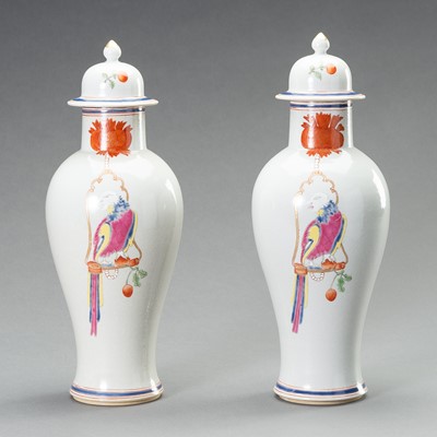 Lot 2009 - A PAIR OF FAMILLE ROSE ‘PARROT ON PERCH’ BALUSTER VASES