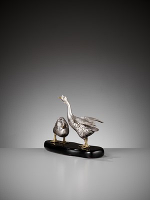 Lot 18 - CHIKAYOSHI: A GILT AND SILVERED BRONZE OKIMONO OF TWO GEESE