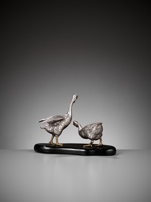 Lot 12 - CHIKAYOSHI: A GILT AND SILVERED BRONZE OKIMONO OF TWO GEESE