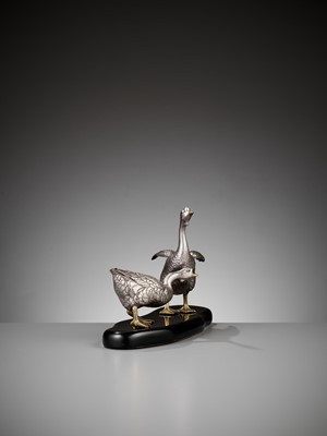 Lot 18 - CHIKAYOSHI: A GILT AND SILVERED BRONZE OKIMONO OF TWO GEESE