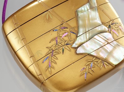 Lot 348 - A FINE MOTHER-OF-PEARL INLAID GOLD LACQUER FOUR-CASE INRO DEPICTING A TIGER IN BAMBOO