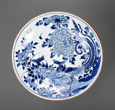 Lot 727 - A LARGE BLUE AND WHITE ‘PHOENIX AND PEONY’ DISH, YU TANG (JADE HALL) MARK, TRANSITIONAL