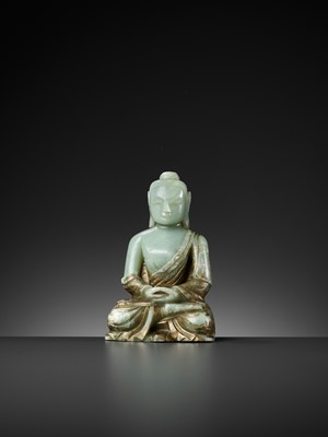Lot 457 - A RARE GILT-DECORATED CELADON JADE FIGURE OF BUDDHA AMITABHA, QING DYNASTY