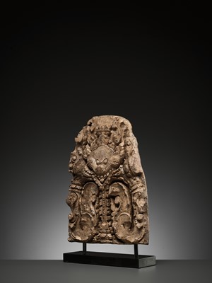 Lot 1170 - A SANDSTONE LINTEL CENTERPIECE DEPICTING A KALA, BANTEAY SREI STYLE, ANGKOR PERIOD