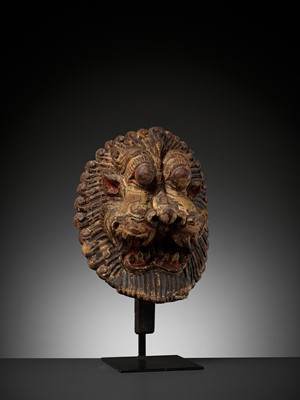 Lot 604 - A LACQUERED WOOD HEAD OF NARASIMHA, 18TH CENTURY
