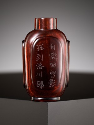 Lot 629 - AN INSCRIBED RUBY-RED GLASS SNUFF BOTTLE, 1750-1850