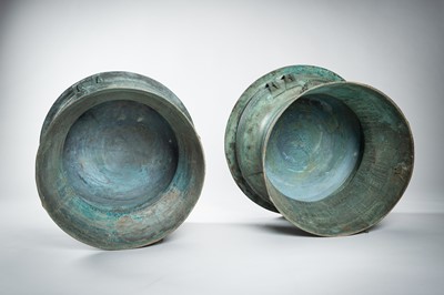 Lot 565 - A FINE PAIR OF ANTIQUE BRONZE RAIN DRUMS, KHA