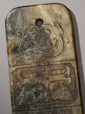 Lot 104 - AN ARCHAISTIC SERPENTINE BLADE, QING DYNASTY