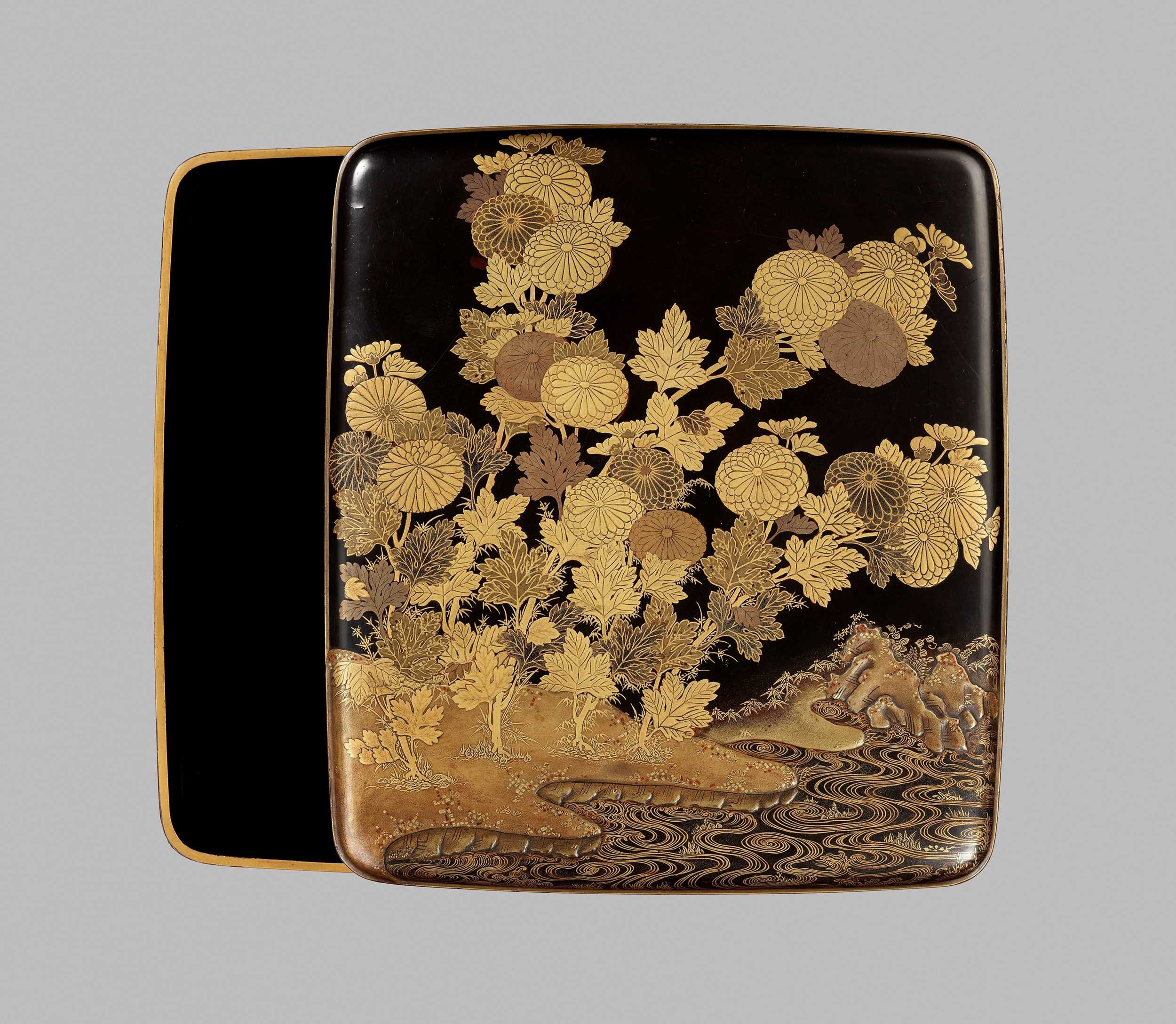Lot 135 - A BLACK AND GOLD LACQUER SUZURIBAKO WITH CHRYSANTHEMUM AND DEER