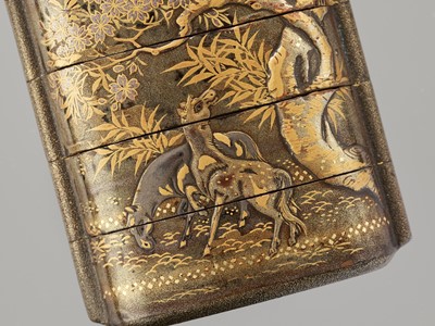 Lot 336 - KAJIKAWA: A GOLD LACQUER FOUR-CASE INRO DEPICTING FROLICKING HORSES