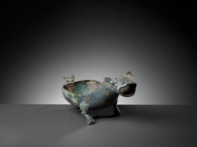 Lot 356 - A RARE BRONZE ‘ROARING BULL’ POURING VESSEL, YI, SPRING AND AUTUMN PERIOD