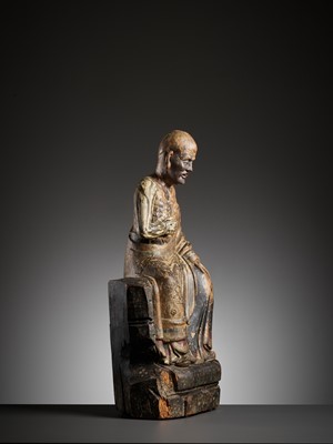 Lot 384 - A PAINTED WOOD AND GESSO FIGURE OF A LUOHAN, MING DYNASTY