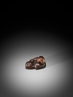 Lot 28 - AWATAGUCHI: A LARGE OLD WOOD NETSUKE OF A RAT WITH CHESTNUTS