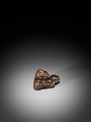 Lot 28 - AWATAGUCHI: A LARGE OLD WOOD NETSUKE OF A RAT WITH CHESTNUTS