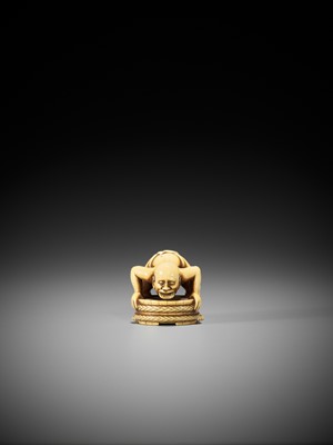 Lot 38 - A VERY RARE IVORY NETSUKE OF A MAN WITH A COIN IN HIS MOUTH