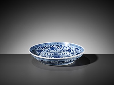Lot 423 - A MING-STYLE BLUE AND WHITE 'LOTUS BOUQUET' DISH, 18TH CENTURY