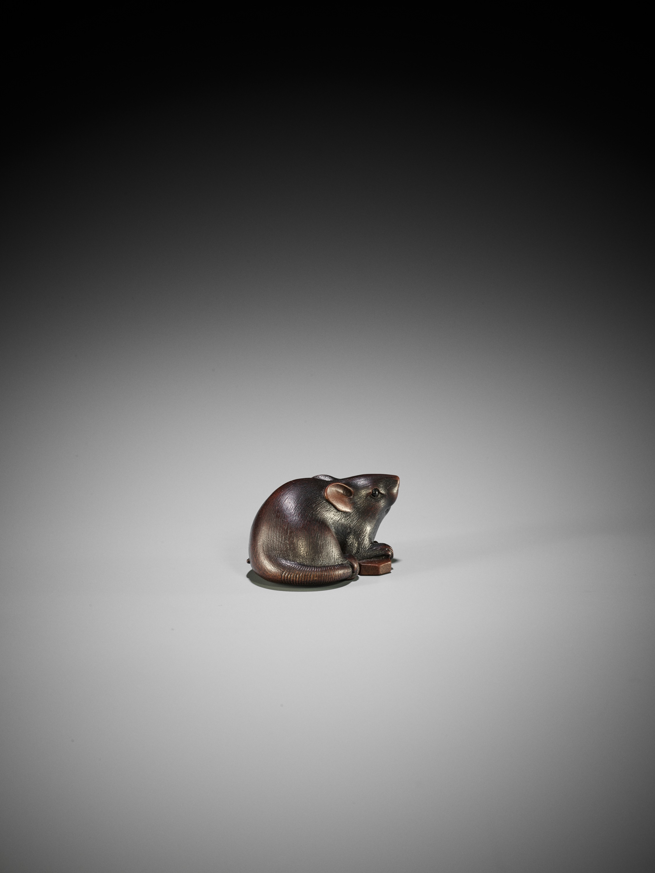 Lot 114 - KANO TOMOKAZU: A SUPERB WOOD NETSUKE OF A